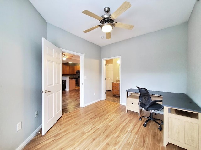 2502 Leon St Unit 515, Austin, TX 78705 - office space with baseboards, light wood-style flooring, and ceiling fan