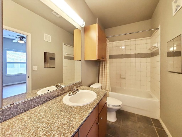 2502 Leon St Unit 515, Austin, TX 78705 - bathroom featuring toilet, visible vents, shower / bath combination with curtain, tile patterned floors, and vanity