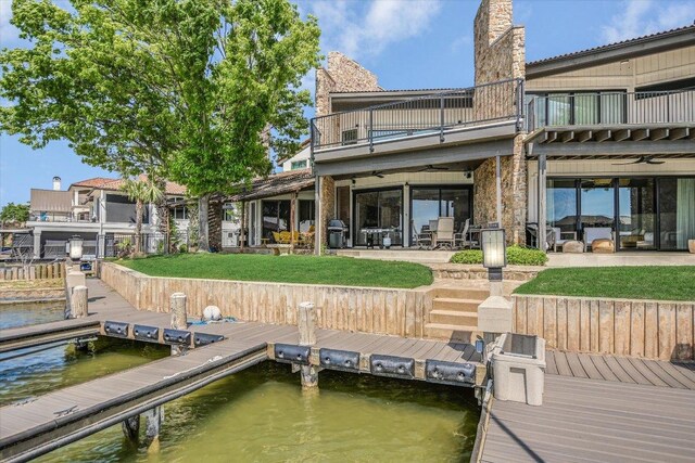 402 Island Dr Unit C, Horseshoe Bay, TX 78657 - rear view of property with a yard, a patio area, a ceiling fan, and a balcony