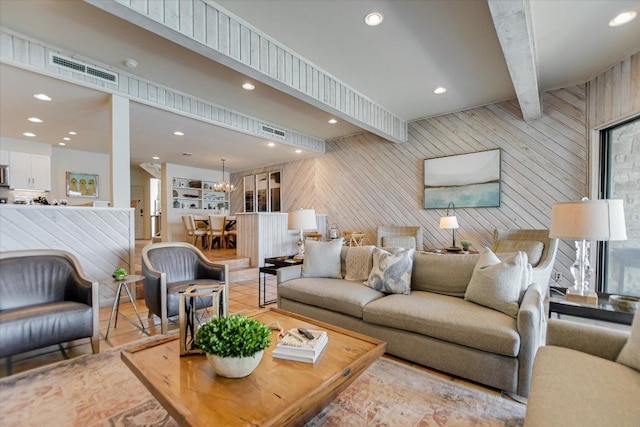 402 Island Dr Unit C, Horseshoe Bay, TX 78657 - living room with recessed lighting, wooden walls, and visible vents
