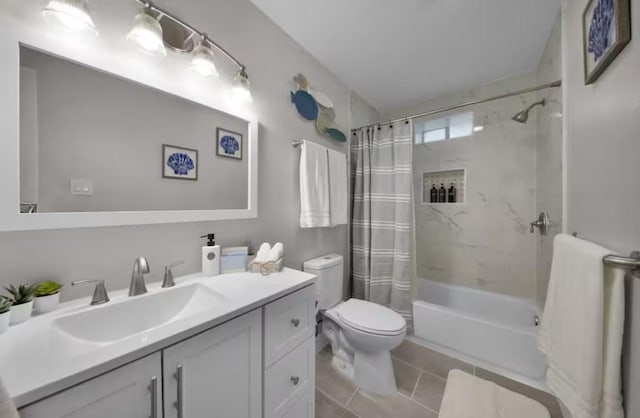 102 W Corral St Unit 2, South Padre Island, TX 78597 - bathroom featuring vanity, shower / tub combo with curtain, and tile patterned flooring