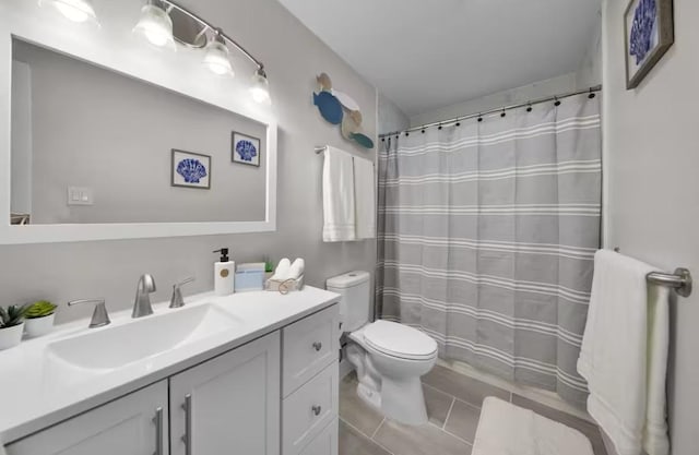 102 W Corral St Unit 2, South Padre Island, TX 78597 - bathroom featuring vanity, tile patterned flooring, and a shower with curtain