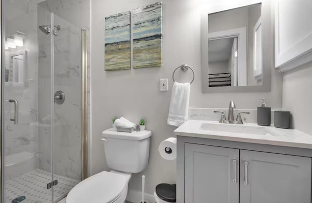 102 W Corral St Unit 2, South Padre Island, TX 78597 - full bathroom featuring toilet, vanity, and a marble finish shower