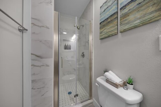 102 W Corral St Unit 2, South Padre Island, TX 78597 - full bathroom with a shower stall and toilet
