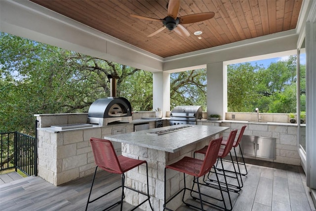 1300 Morning Moon Cir, Austin, TX 78732 - wooden deck with ceiling fan