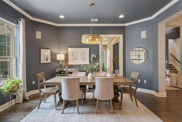 1300 Morning Moon Cir, Austin, TX 78732 - dining space with baseboards, wood finished floors, recessed lighting, crown molding, and stairs