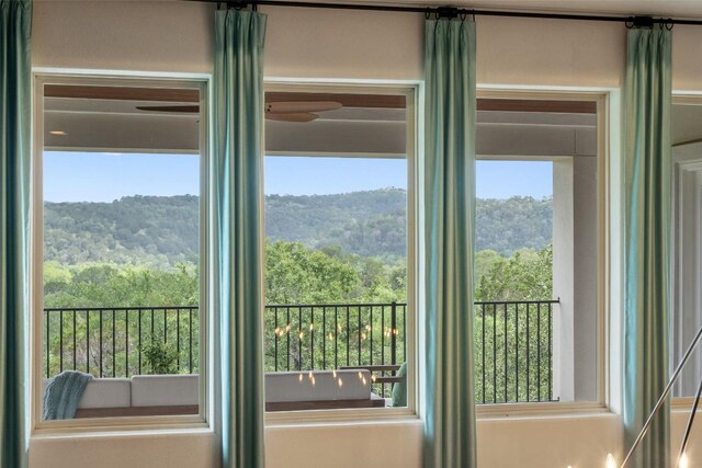 1300 Morning Moon Cir, Austin, TX 78732 - entryway featuring a view of trees