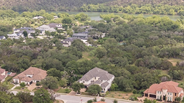 1300 Morning Moon Cir, Austin, TX 78732 - aerial perspective of suburban area with a forest and a nearby body of water