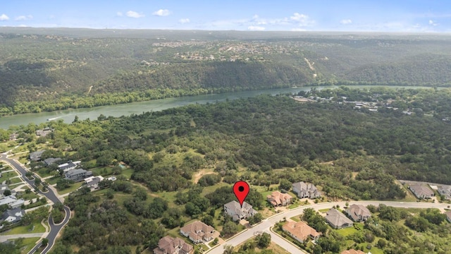 1300 Morning Moon Cir, Austin, TX 78732 - view of property location with a heavily wooded area and a large body of water