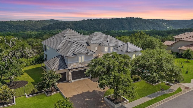 1300 Morning Moon Cir, Austin, TX 78732 - view from above of property featuring a heavily wooded area