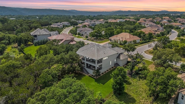 1300 Morning Moon Cir, Austin, TX 78732 - aerial view at dusk of a residential view and a mountain view