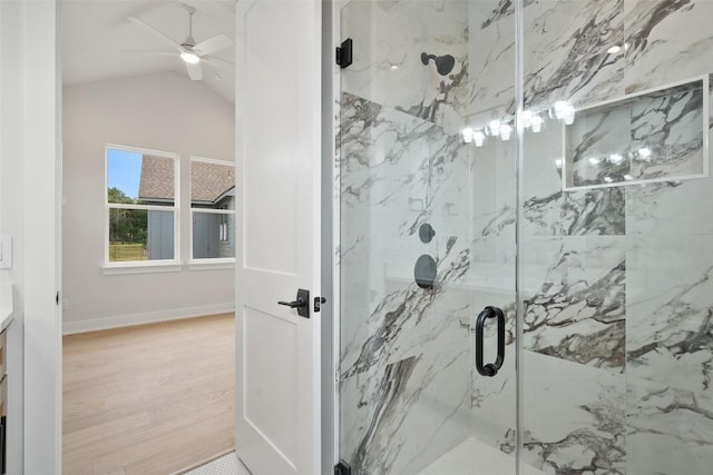 6309 Friendswood Dr, Austin, TX 78723 - full bath featuring a marble finish shower, lofted ceiling, ceiling fan, and wood finished floors