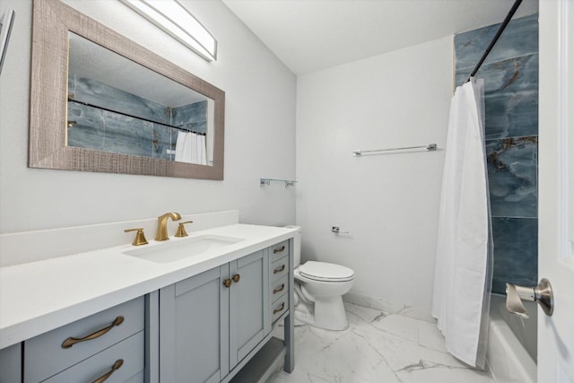 bathroom with vanity, toilet, marble finish floor, and shower / bath combo