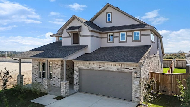 505 Golden Sage Ave, Georgetown, TX 78633 - view of front of property with stucco siding, a garage, a shingled roof, concrete driveway, and brick siding