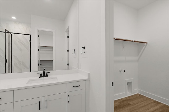 505 Golden Sage Ave, Georgetown, TX 78633 - laundry room featuring hookup for an electric dryer and light wood finished floors