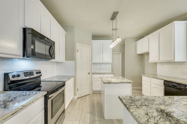 kitchen featuring black appliances, backsplash, and white cabinetry