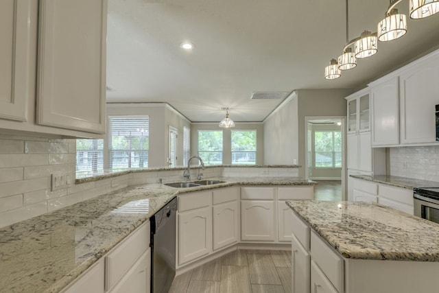 2601 Cascade Falls Dr, Austin, TX 78738 - kitchen featuring a sink, dishwasher, decorative backsplash, white cabinets, and decorative light fixtures