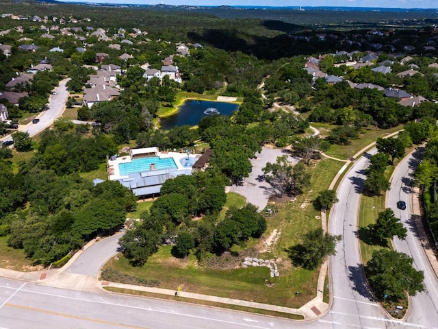 aerial view of property's location featuring a nearby body of water
