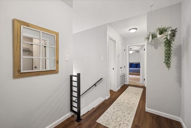 105 S Rainbow Bridge Dr, Cedar Park, TX 78613 - hall with an upstairs landing and dark wood-style flooring