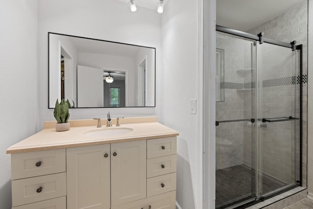 105 S Rainbow Bridge Dr, Cedar Park, TX 78613 - full bath featuring a shower stall, vanity, and ceiling fan