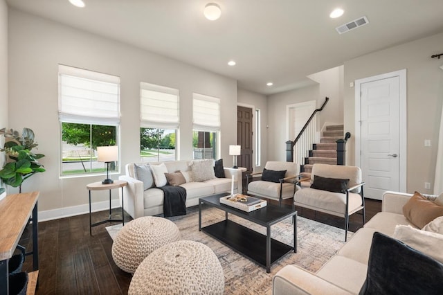 6800 Idea Rd, Austin, TX 78741 - living area with hardwood / wood-style floors, visible vents, baseboards, stairway, and recessed lighting