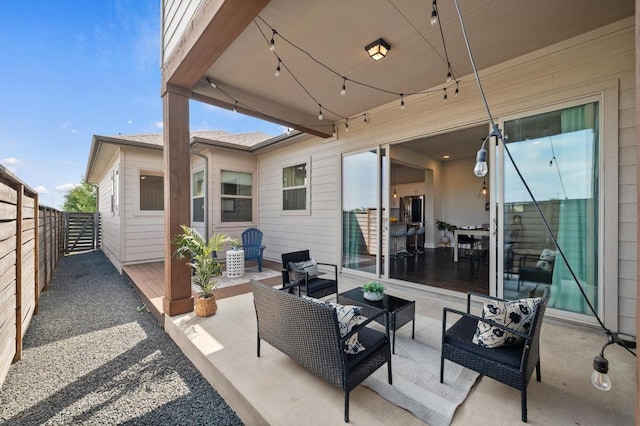 6800 Idea Rd, Austin, TX 78741 - view of patio featuring an outdoor living space and fence