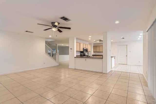 1171 Southern Pl, Round Rock, TX 78665 - unfurnished living room with light tile patterned floors, recessed lighting, ceiling fan, and visible vents