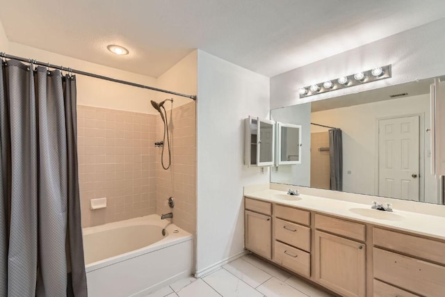 1171 Southern Pl, Round Rock, TX 78665 - full bath featuring double vanity, shower / tub combo, baseboards, and a sink
