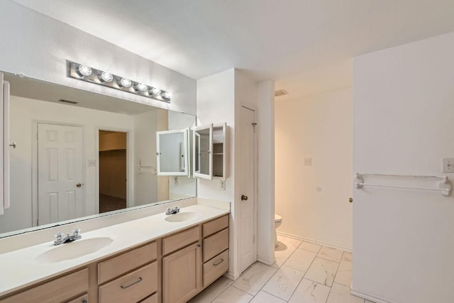 1171 Southern Pl, Round Rock, TX 78665 - bathroom with marble look tiles, double vanity, and a walk in closet