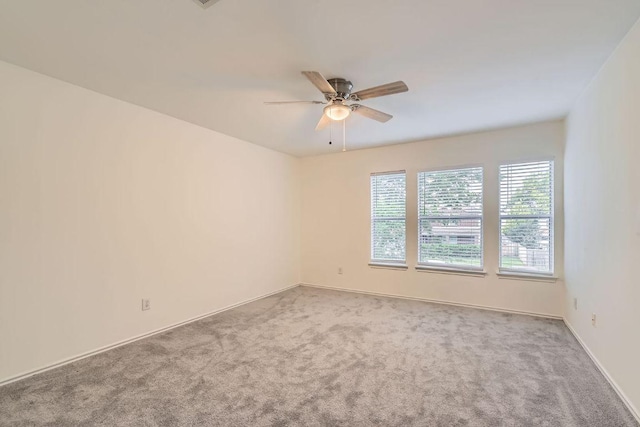 1171 Southern Pl, Round Rock, TX 78665 - carpeted empty room with baseboards and a ceiling fan