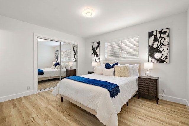 2927 Norwood Hill Rd, Austin, TX 78723 - bedroom with wood finished floors and a closet