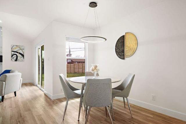 2927 Norwood Hill Rd, Austin, TX 78723 - dining space with wood finished floors and vaulted ceiling
