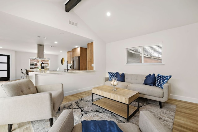 2927 Norwood Hill Rd, Austin, TX 78723 - living area with beam ceiling, light wood-type flooring, recessed lighting, and high vaulted ceiling