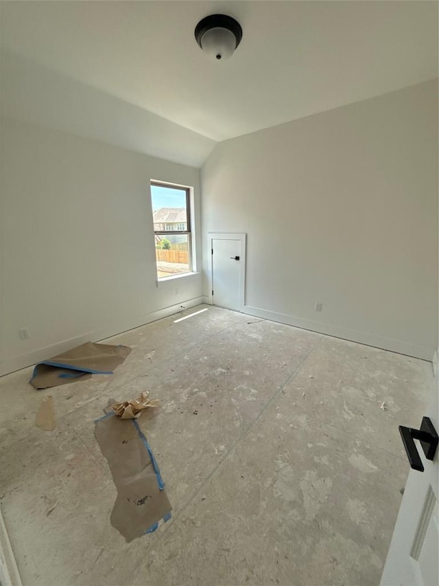 1033 Blanket Flower Dr, Georgetown, TX 78628 - spare room featuring lofted ceiling and baseboards