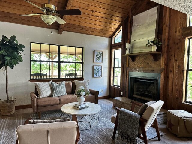 10400 Bitting School Rd, Manor, TX 78653 - living area with healthy amount of natural light, lofted ceiling, wood finished floors, wood ceiling, and a ceiling fan