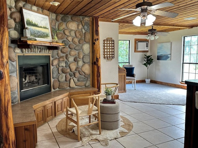 10400 Bitting School Rd, Manor, TX 78653 - living area with wood ceiling, a ceiling fan, light tile patterned floors, light carpet, and a fireplace