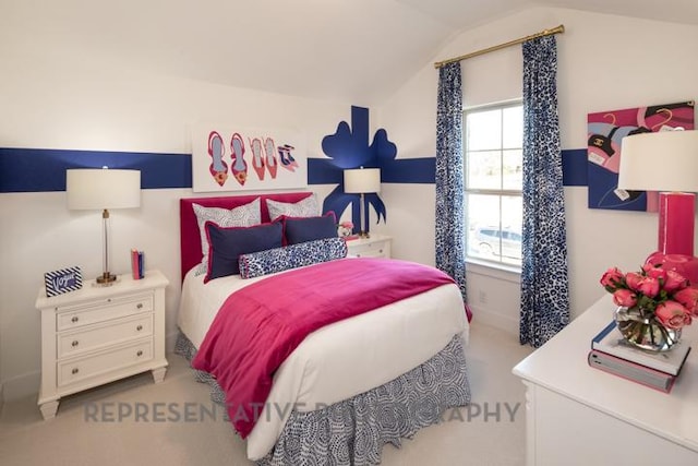 carpeted bedroom featuring lofted ceiling