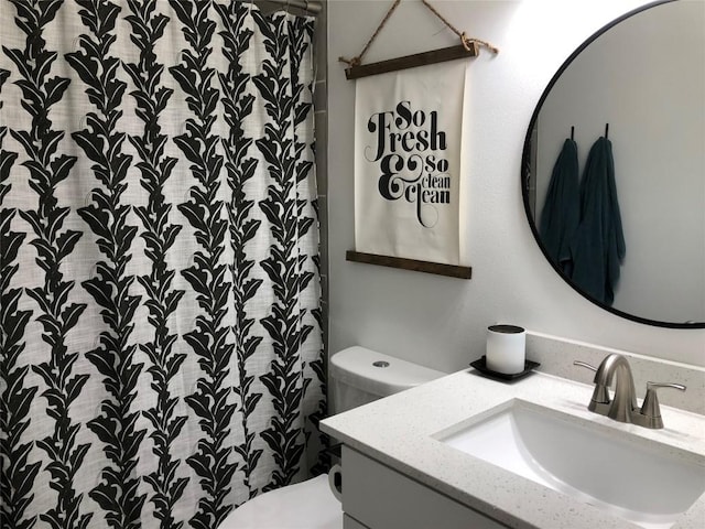6409 Burns St Unit 306, Austin, TX 78752 - full bath with curtained shower, vanity, and toilet