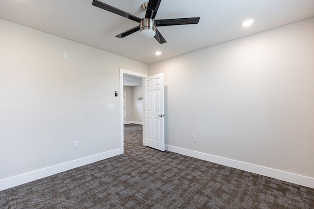 unfurnished bedroom with ceiling fan, dark colored carpet, baseboards, and recessed lighting