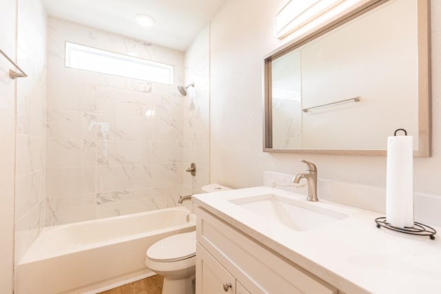 full bathroom featuring vanity, toilet, and tub / shower combination