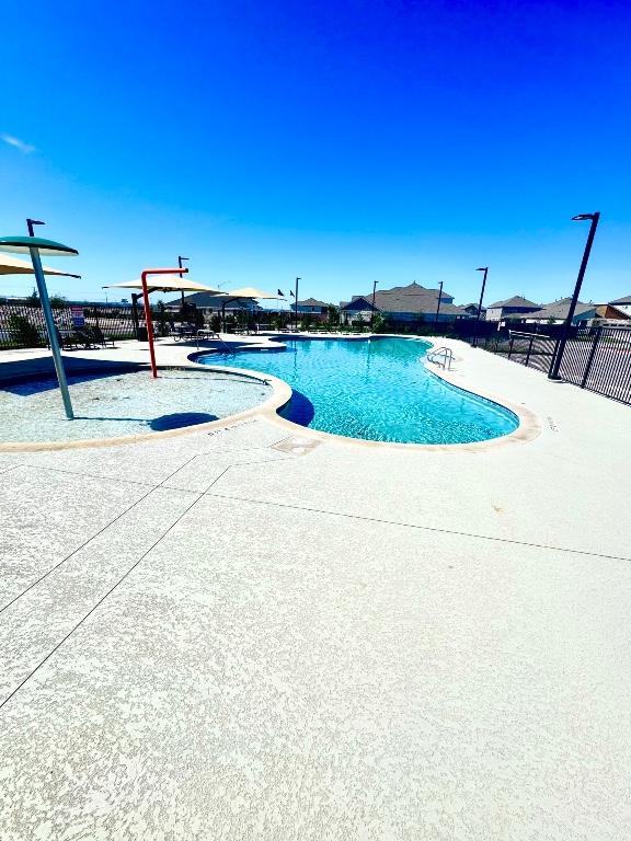 4319 Port Hope St, Round Rock, TX 78665 - community pool featuring a patio