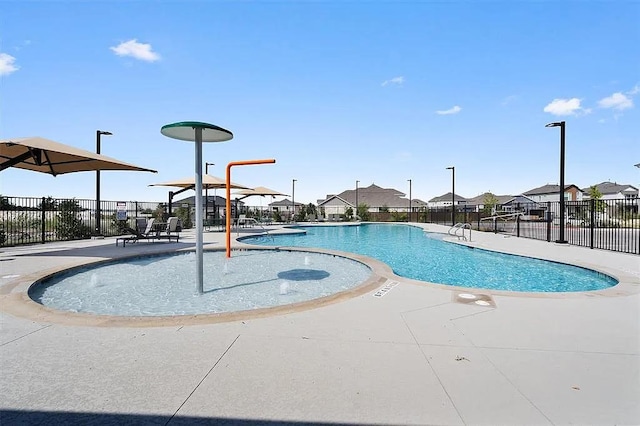4319 Port Hope St, Round Rock, TX 78665 - community pool with a residential view and a patio area