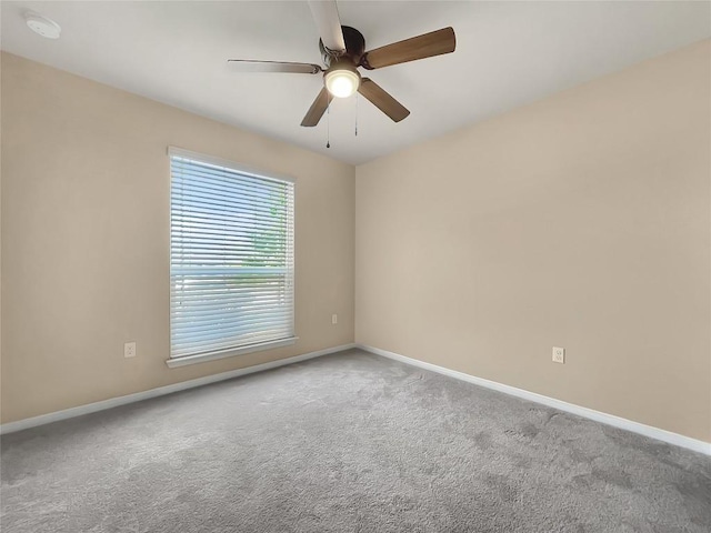 127 Navidad River Dr, Hutto, TX 78634 - empty room with baseboards, ceiling fan, and carpet