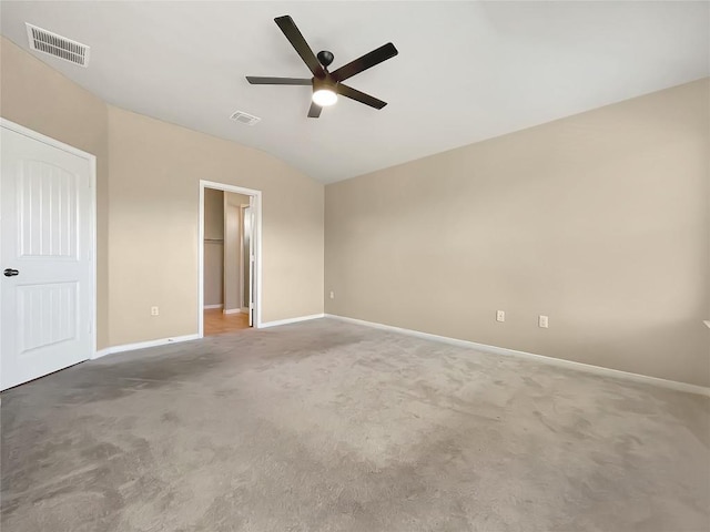 127 Navidad River Dr, Hutto, TX 78634 - unfurnished bedroom featuring baseboards, carpet, lofted ceiling, and a ceiling fan