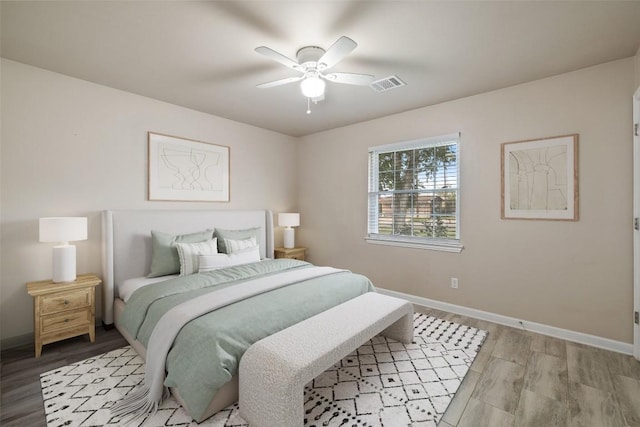 216 Lizzie St, Taylor, TX 76574 - bedroom featuring light wood-style floors and ceiling fan