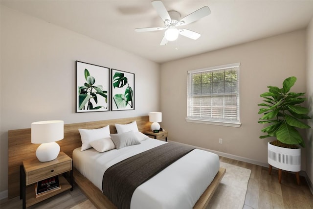 216 Lizzie St, Taylor, TX 76574 - bedroom featuring light wood finished floors and ceiling fan