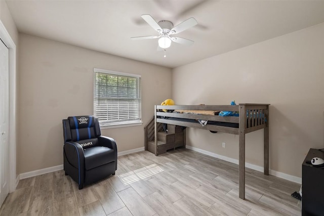216 Lizzie St, Taylor, TX 76574 - bedroom featuring light wood finished floors and a ceiling fan