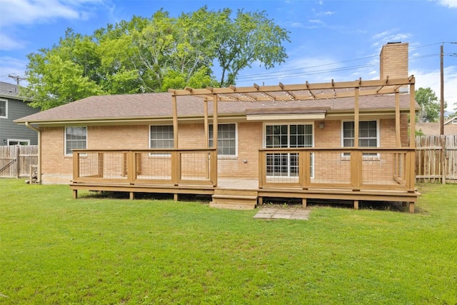 216 Lizzie St, Taylor, TX 76574 - back of house with brick siding, a chimney, a wooden deck, and roof with shingles