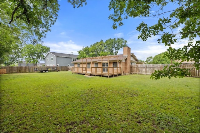 216 Lizzie St, Taylor, TX 76574 - fenced backyard with a deck