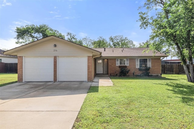 216 Lizzie St, Taylor, TX 76574 - single story home with brick siding, driveway, an attached garage, and a shingled roof